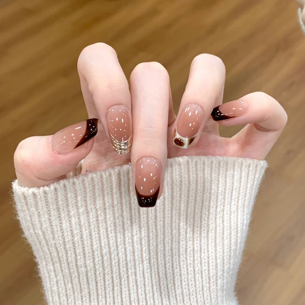 Dark brown manicure smudged chocolate wearing armor